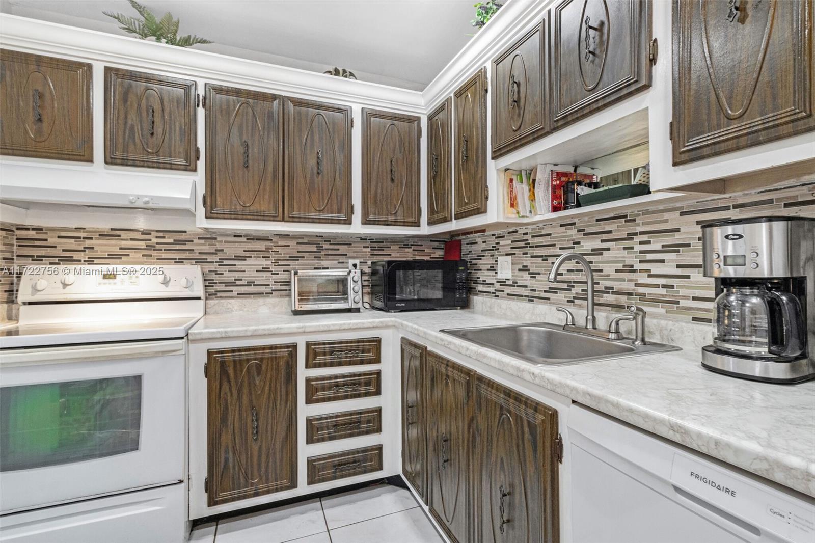 4000 NW 44th Ave # 205, Lauderdale Lakes FL 33319 — #A11722756