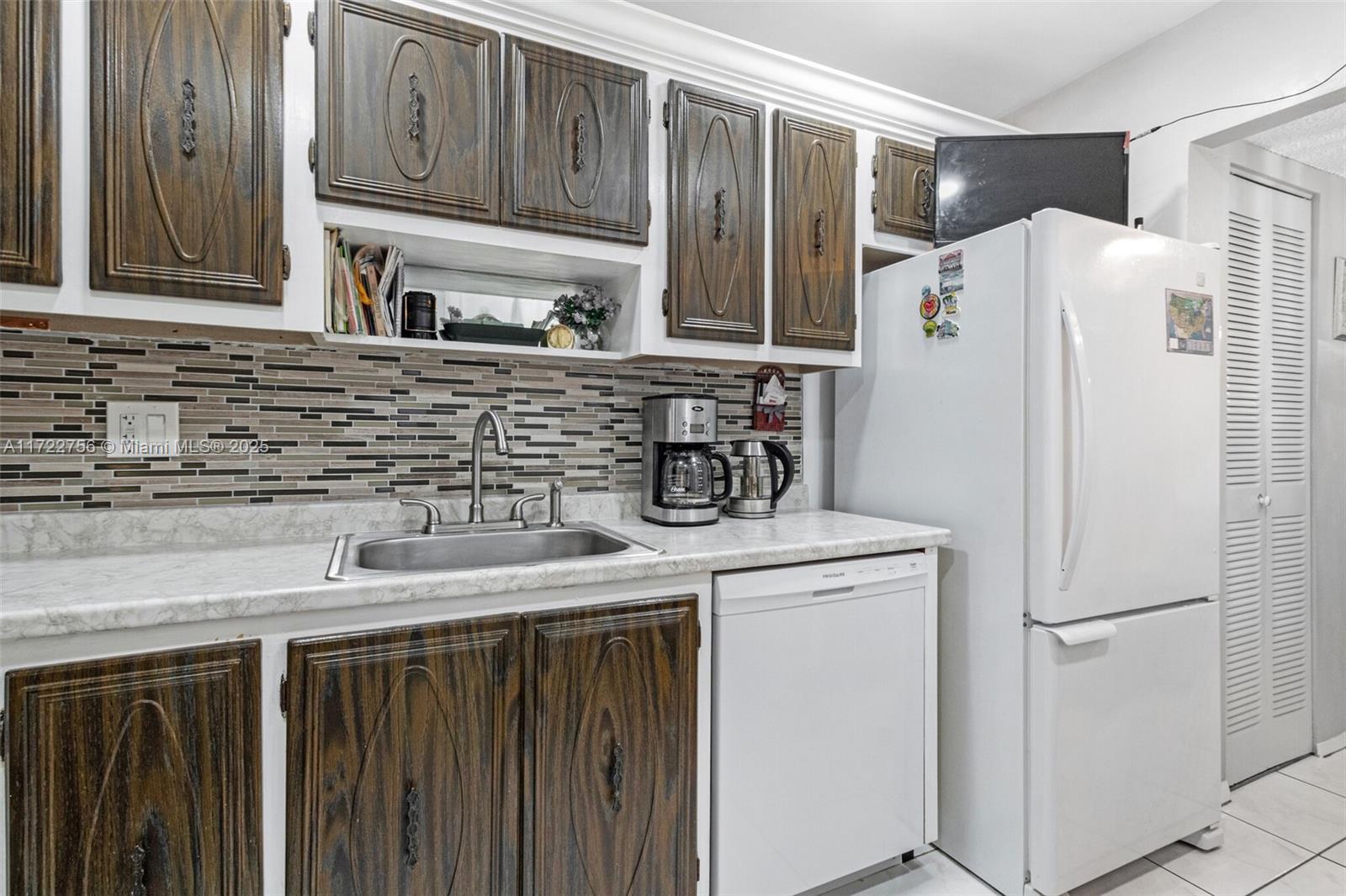 4000 NW 44th Ave # 205, Lauderdale Lakes FL 33319 — #A11722756